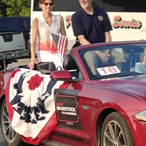Alan Bradstock and Lois Bower-Bjornson riding in the Jacktown Fair opening day parade